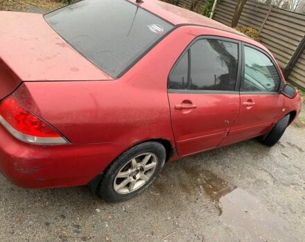 Червоний Міцубісі Lancer, об'ємом двигуна 1.6 л та пробігом 300 тис. км за 2799 $, фото 3 на Automoto.ua