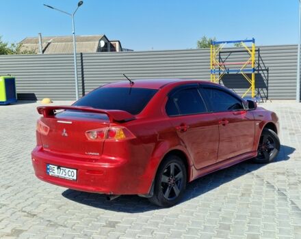 Красный Мицубиси Лансер, объемом двигателя 2 л и пробегом 274 тыс. км за 6000 $, фото 7 на Automoto.ua
