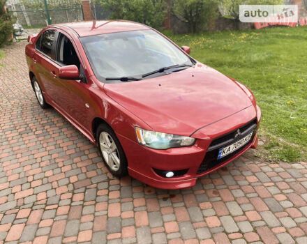 Червоний Міцубісі Lancer, об'ємом двигуна 2 л та пробігом 191 тис. км за 7500 $, фото 19 на Automoto.ua