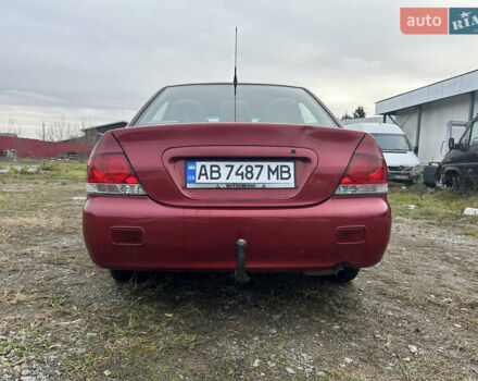 Красный Мицубиси Лансер, объемом двигателя 1.58 л и пробегом 280 тыс. км за 3250 $, фото 8 на Automoto.ua