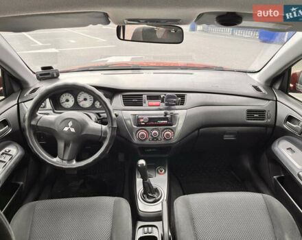 Червоний Міцубісі Lancer, об'ємом двигуна 1.6 л та пробігом 194 тис. км за 5500 $, фото 11 на Automoto.ua