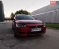 Красный Мицубиси Лансер, объемом двигателя 1.5 л и пробегом 210 тыс. км за 5799 $, фото 10 на Automoto.ua