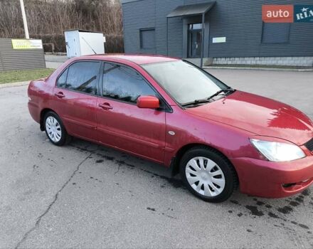 Червоний Міцубісі Lancer, об'ємом двигуна 1.58 л та пробігом 140 тис. км за 6000 $, фото 3 на Automoto.ua