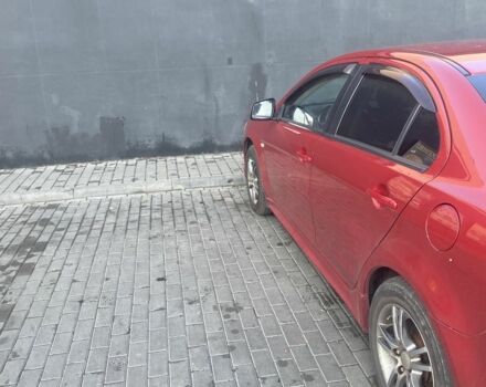 Червоний Міцубісі Lancer, об'ємом двигуна 2 л та пробігом 200 тис. км за 5350 $, фото 7 на Automoto.ua