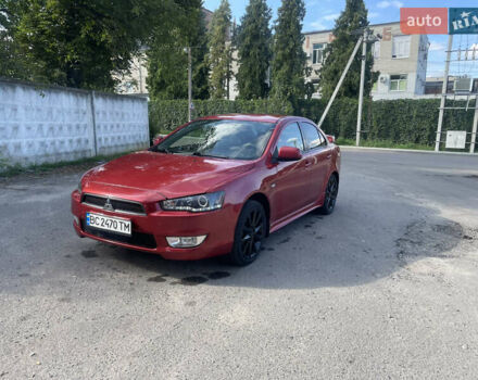 Червоний Міцубісі Lancer, об'ємом двигуна 2 л та пробігом 179 тис. км за 6499 $, фото 4 на Automoto.ua