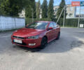 Червоний Міцубісі Lancer, об'ємом двигуна 2 л та пробігом 179 тис. км за 6499 $, фото 4 на Automoto.ua