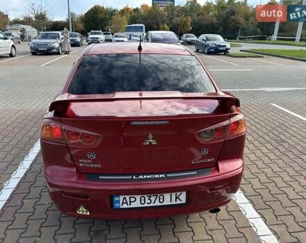 Красный Мицубиси Лансер, объемом двигателя 2 л и пробегом 227 тыс. км за 7000 $, фото 19 на Automoto.ua