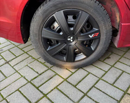 Красный Мицубиси Лансер, объемом двигателя 2 л и пробегом 143 тыс. км за 5200 $, фото 3 на Automoto.ua