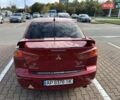 Красный Мицубиси Лансер, объемом двигателя 2 л и пробегом 227 тыс. км за 7000 $, фото 19 на Automoto.ua