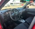Червоний Міцубісі Lancer, об'ємом двигуна 1.58 л та пробігом 223 тис. км за 6400 $, фото 19 на Automoto.ua