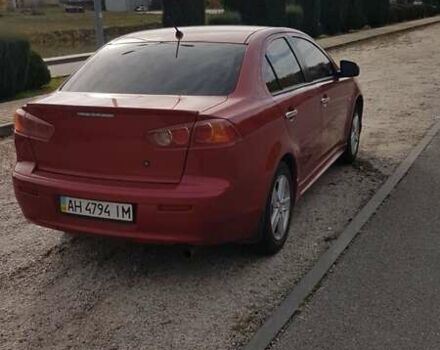 Червоний Міцубісі Lancer, об'ємом двигуна 2 л та пробігом 217 тис. км за 7100 $, фото 5 на Automoto.ua