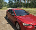 Червоний Міцубісі Lancer, об'ємом двигуна 2 л та пробігом 230 тис. км за 5800 $, фото 1 на Automoto.ua