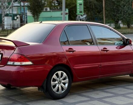 Червоний Міцубісі Lancer, об'ємом двигуна 1.6 л та пробігом 159 тис. км за 4500 $, фото 3 на Automoto.ua