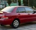 Червоний Міцубісі Lancer, об'ємом двигуна 1.6 л та пробігом 159 тис. км за 4500 $, фото 3 на Automoto.ua