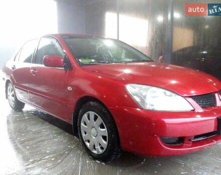 Червоний Міцубісі Lancer, об'ємом двигуна 1.6 л та пробігом 242 тис. км за 5100 $, фото 4 на Automoto.ua
