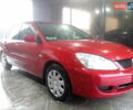 Червоний Міцубісі Lancer, об'ємом двигуна 1.6 л та пробігом 242 тис. км за 5100 $, фото 4 на Automoto.ua