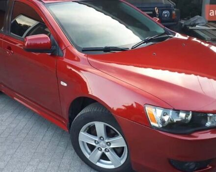 Червоний Міцубісі Lancer, об'ємом двигуна 2 л та пробігом 141 тис. км за 7600 $, фото 2 на Automoto.ua