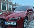 Красный Мицубиси Лансер, объемом двигателя 2 л и пробегом 180 тыс. км за 7250 $, фото 1 на Automoto.ua