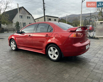 Червоний Міцубісі Lancer, об'ємом двигуна 2 л та пробігом 150 тис. км за 7000 $, фото 7 на Automoto.ua