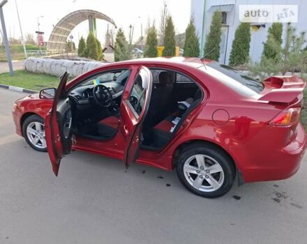 Червоний Міцубісі Lancer, об'ємом двигуна 2 л та пробігом 223 тис. км за 6950 $, фото 18 на Automoto.ua