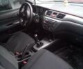 Червоний Міцубісі Lancer, об'ємом двигуна 1.6 л та пробігом 191 тис. км за 4900 $, фото 6 на Automoto.ua