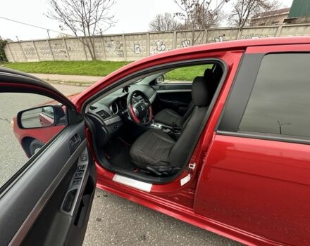 Красный Мицубиси Лансер, объемом двигателя 2 л и пробегом 366 тыс. км за 6500 $, фото 7 на Automoto.ua