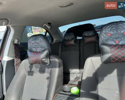 Красный Мицубиси Лансер, объемом двигателя 2 л и пробегом 227 тыс. км за 7000 $, фото 18 на Automoto.ua