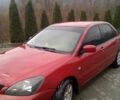 Червоний Міцубісі Lancer, об'ємом двигуна 1.6 л та пробігом 191 тис. км за 4900 $, фото 1 на Automoto.ua