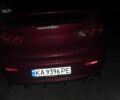 Червоний Міцубісі Lancer, об'ємом двигуна 2 л та пробігом 172 тис. км за 7000 $, фото 1 на Automoto.ua