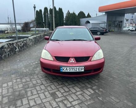 Красный Мицубиси Лансер, объемом двигателя 1.6 л и пробегом 265 тыс. км за 2956 $, фото 14 на Automoto.ua