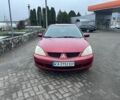 Красный Мицубиси Лансер, объемом двигателя 1.6 л и пробегом 265 тыс. км за 2956 $, фото 14 на Automoto.ua