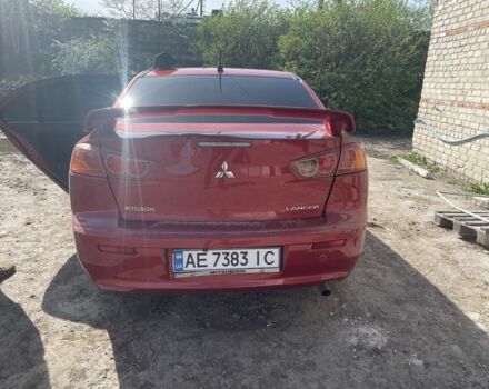 Червоний Міцубісі Lancer, об'ємом двигуна 2 л та пробігом 241 тис. км за 5500 $, фото 3 на Automoto.ua