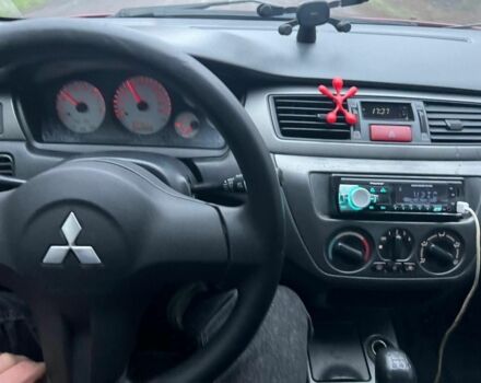 Красный Мицубиси Лансер, объемом двигателя 1.6 л и пробегом 265 тыс. км за 2956 $, фото 10 на Automoto.ua