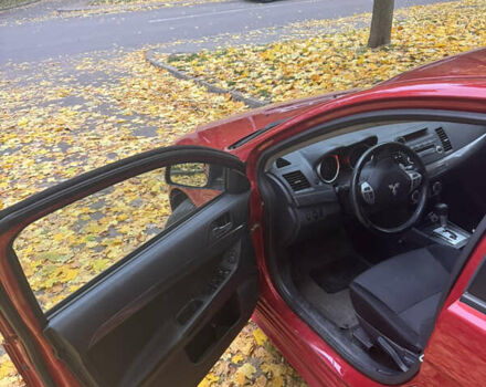 Червоний Міцубісі Lancer, об'ємом двигуна 2 л та пробігом 203 тис. км за 8000 $, фото 17 на Automoto.ua
