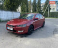Червоний Міцубісі Lancer, об'ємом двигуна 2 л та пробігом 179 тис. км за 6499 $, фото 1 на Automoto.ua