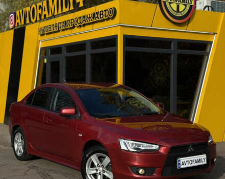 Червоний Міцубісі Lancer, об'ємом двигуна 2 л та пробігом 215 тис. км за 6500 $, фото 2 на Automoto.ua
