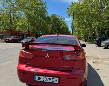 Червоний Міцубісі Lancer, об'ємом двигуна 2 л та пробігом 255 тис. км за 5200 $, фото 1 на Automoto.ua