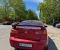 Червоний Міцубісі Lancer, об'ємом двигуна 2 л та пробігом 255 тис. км за 5200 $, фото 1 на Automoto.ua