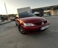 Червоний Міцубісі Lancer, об'ємом двигуна 1.6 л та пробігом 257 тис. км за 4600 $, фото 4 на Automoto.ua