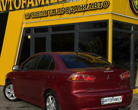 Червоний Міцубісі Lancer, об'ємом двигуна 2 л та пробігом 215 тис. км за 6500 $, фото 5 на Automoto.ua