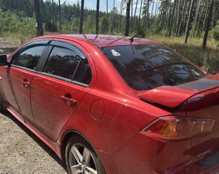 Червоний Міцубісі Lancer, об'ємом двигуна 2 л та пробігом 230 тис. км за 5800 $, фото 2 на Automoto.ua