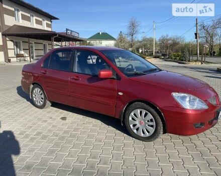 Червоний Міцубісі Lancer, об'ємом двигуна 0 л та пробігом 160 тис. км за 4244 $, фото 35 на Automoto.ua