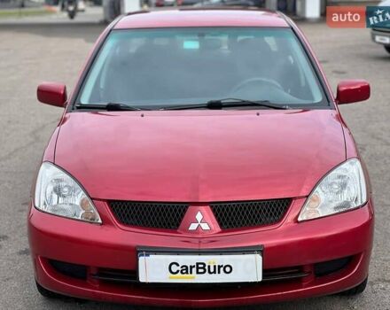 Червоний Міцубісі Lancer, об'ємом двигуна 1.58 л та пробігом 223 тис. км за 6400 $, фото 5 на Automoto.ua