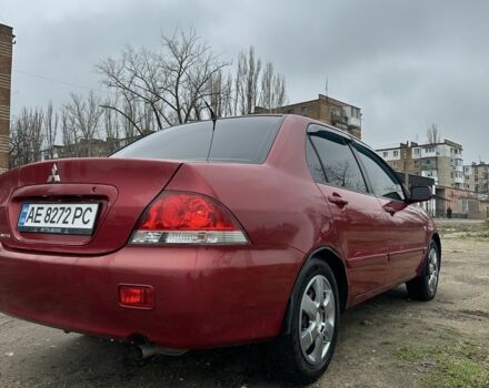 Червоний Міцубісі Lancer, об'ємом двигуна 1.6 л та пробігом 224 тис. км за 4300 $, фото 3 на Automoto.ua