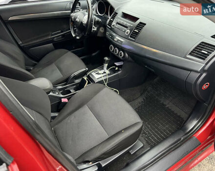 Красный Мицубиси Лансер, объемом двигателя 2 л и пробегом 330 тыс. км за 5250 $, фото 8 на Automoto.ua