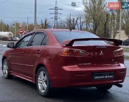 Красный Мицубиси Лансер, объемом двигателя 1.5 л и пробегом 120 тыс. км за 7699 $, фото 5 на Automoto.ua