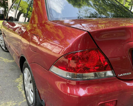 Червоний Міцубісі Lancer, об'ємом двигуна 1.6 л та пробігом 270 тис. км за 5699 $, фото 17 на Automoto.ua
