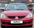 Червоний Міцубісі Lancer, об'ємом двигуна 1.58 л та пробігом 223 тис. км за 6400 $, фото 4 на Automoto.ua