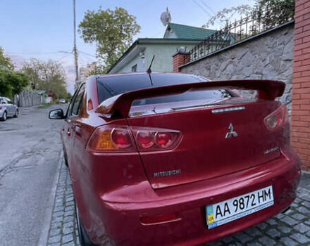Міцубісі Lancer 2008 у Києві на Automoto.ua Червоний Міцубісі Lancer, об'ємом двигуна 2 л та пробігом 250 тис. км за 7000 $, фото 4 на Automoto.ua