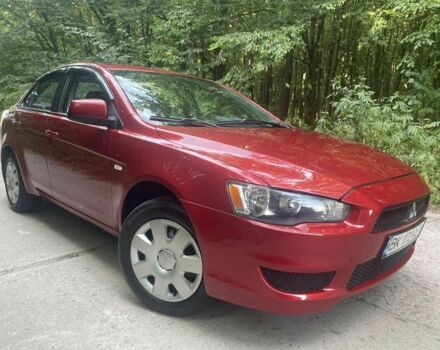 Красный Мицубиси Лансер, объемом двигателя 1.5 л и пробегом 124 тыс. км за 6300 $, фото 3 на Automoto.ua